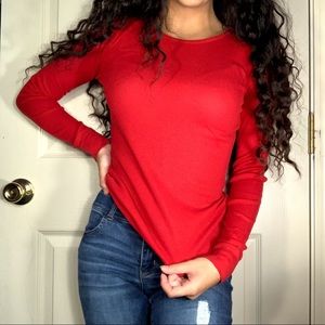 red stretchy long sleeve shirt